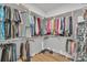 A spacious walk-in closet features built-in shelving and rods for ample storage at 3006 Constitution Ln, Gastonia, NC 28056