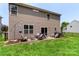 Inviting backyard features a cozy patio setup perfect for entertaining and outdoor dining at 4006 Centerview Dr, Indian Trail, NC 28079