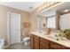 Bathroom with double sink vanity, large mirror, and neutral tones at 4006 Centerview Dr, Indian Trail, NC 28079