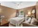 Cozy bedroom features warm tones, soft lighting, and comfortable furnishings at 4006 Centerview Dr, Indian Trail, NC 28079