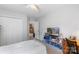 Comfortable bedroom featuring a cozy bed, spacious closet, and a functional desk area, perfect for relaxation and study at 4006 Centerview Dr, Indian Trail, NC 28079