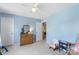 Sunny bedroom featuring light blue walls, classic furnishings and ample natural light at 4006 Centerview Dr, Indian Trail, NC 28079