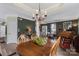 Charming dining room showcases natural light, chandelier, decor, with an open floor plan at 4006 Centerview Dr, Indian Trail, NC 28079