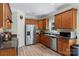 Well-equipped kitchen featuring stainless steel appliances, granite countertops, and custom cabinetry at 4006 Centerview Dr, Indian Trail, NC 28079