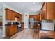 Spacious kitchen features stainless appliances, wood cabinets, stone countertops, with ample storage at 4006 Centerview Dr, Indian Trail, NC 28079