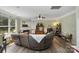 Comfortable living room with a cozy fireplace, ceiling fan, and stylish decor at 4006 Centerview Dr, Indian Trail, NC 28079