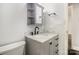 Updated bathroom featuring marble countertop, gray vanity and matte black faucet at 403 Weaver St, Cherryville, NC 28021