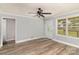 Inviting living room features a decorative front door, ample natural light, and wood-look flooring at 403 Weaver St, Cherryville, NC 28021