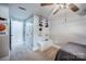 This bedroom has a ceiling fan, a closet with double doors, and a shoe rack on the wall at 411 Saint Andrews Rd, Statesville, NC 28625