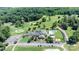 Aerial view of a clubhouse with golf course, pool and parking at 411 Saint Andrews Rd, Statesville, NC 28625
