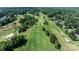 Picturesque aerial view of a lush golf course with sand traps and green fairways at 411 Saint Andrews Rd, Statesville, NC 28625