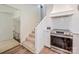 The home's kitchen is located next to the staircase at 411 Saint Andrews Rd, Statesville, NC 28625