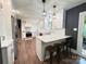 Contemporary kitchen featuring stainless steel appliances and a stylish breakfast bar at 411 Saint Andrews Rd, Statesville, NC 28625