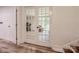 Bright office space with glass panel doors, leading to a view of the backyard at 411 Saint Andrews Rd, Statesville, NC 28625