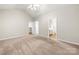 Neutral bedroom featuring neutral carpet, walk in closet, and attached bath at 4510 Glenlea Commons Dr, Charlotte, NC 28216