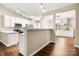 Spacious kitchen with breakfast bar and views of the dining room at 4510 Glenlea Commons Dr, Charlotte, NC 28216