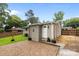 A backyard featuring a brick patio, a grass yard, and the back exterior of a home at 5008 Unaka Ave, Charlotte, NC 28205