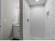 Bathroom features a white-tiled walk-in shower with modern fixtures and a granite vanity at 5008 Unaka Ave, Charlotte, NC 28205