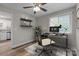 Bright office space with modern desk, floating shelves, and view of the Kitchen at 5008 Unaka Ave, Charlotte, NC 28205