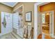 Well-appointed bathroom with glass block shower and soaking tub with stylish vanity at 517 Kingsdown Ct, Waxhaw, NC 28173