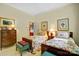 Charming bedroom with two twin beds, classic decor, and ample natural light at 517 Kingsdown Ct, Waxhaw, NC 28173