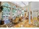 Inviting living room with abundant natural light, refined furniture, and tasteful décor creating a comfortable and sophisticated space at 517 Kingsdown Ct, Waxhaw, NC 28173