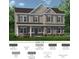 New two-story home boasts stone accents and a welcoming front porch at 524 Hullview Vis, Monroe, NC 28110