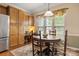 A breakfast nook showcasing built in cabinets, a round table, and a window at 56113 Finches Ct, Indian Land, SC 29707