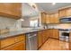 Well-appointed kitchen featuring stainless steel appliances, granite countertops, and ample cabinet space at 56113 Finches Ct, Indian Land, SC 29707