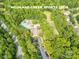 Aerial view of Highland Creek Sports Club featuring mature trees and walking trails at 5963 Pale Moss Ln, Charlotte, NC 28269