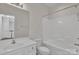 Bright bathroom featuring a mirror, white sink, toilet and shower at 5963 Pale Moss Ln, Charlotte, NC 28269
