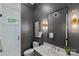 Sleek bathroom with modern fixtures, a glass-enclosed shower, and stylish vanity at 639 Edgemont Rd, Charlotte, NC 28211