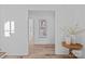 Foyer with hardwood floors and view of artwork at 639 Edgemont Rd, Charlotte, NC 28211
