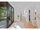 Bright foyer with hardwood floors, staircase, and natural light, creating a welcoming entrance at 639 Edgemont Rd, Charlotte, NC 28211