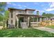 Stunning modern home featuring stone accents, manicured lawn, and a welcoming entrance at 639 Edgemont Rd, Charlotte, NC 28211