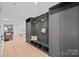 Organized mudroom featuring built-in storage, a bench, and stylish decor, perfect for entry at 639 Edgemont Rd, Charlotte, NC 28211