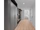 Well-organized mudroom featuring built-in storage, coat hooks, and convenient access to the rest of the house at 639 Edgemont Rd, Charlotte, NC 28211