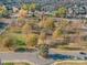 Aerial view showcasing a park with walking paths, gazebo, and beautifully landscaped greenery at 6834 Creft Cir, Indian Trail, NC 28079