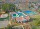 Aerial view of community center with pool, tennis courts, playground, and ample parking at 6834 Creft Cir, Indian Trail, NC 28079