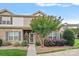 Charming brick townhouse with well-maintained landscaping and a welcoming front entrance at 6834 Creft Cir, Indian Trail, NC 28079