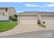 Spacious two-car garage with paved driveway and well-maintained landscaping at 6834 Creft Cir, Indian Trail, NC 28079