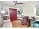 Bright bedroom with hardwood floors, a ceiling fan, and a charming wardrobe at 7526 Shadowstone Dr, Charlotte, NC 28270