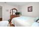 Comfortable bedroom with a wooden dresser, and soft quilt at 7526 Shadowstone Dr, Charlotte, NC 28270