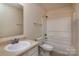 Bathroom with a vanity, sink, and shower-tub combination at 7623 Monarch Birch Ln, Charlotte, NC 28215