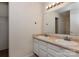 Bathroom showcasing dual sinks and a large vanity mirror at 7623 Monarch Birch Ln, Charlotte, NC 28215