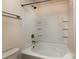 Bathroom features a tub and shower combination with tile surround at 7623 Monarch Birch Ln, Charlotte, NC 28215
