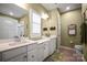 Elegant bathroom with double vanity, white cabinets, and plenty of counter space at 8232 Bretton Woods Dr, Charlotte, NC 28227