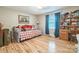 Cozy bedroom featuring hardwood floors, a daybed, and natural light at 1005 Fieldstone Rd, Mooresville, NC 28115