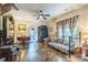 Spacious living room showcasing unique flooring, a bed, and abundant natural light at 1005 Fieldstone Rd, Mooresville, NC 28115