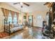 Bright living room with unique flooring, a decorative bed, and vintage decor at 1005 Fieldstone Rd, Mooresville, NC 28115
